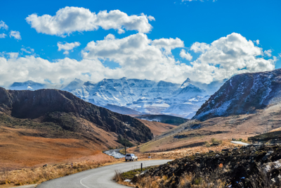 Picture perfect snow capped Drakensberg mountains and green plains in Underberg near Sani pass South Africa